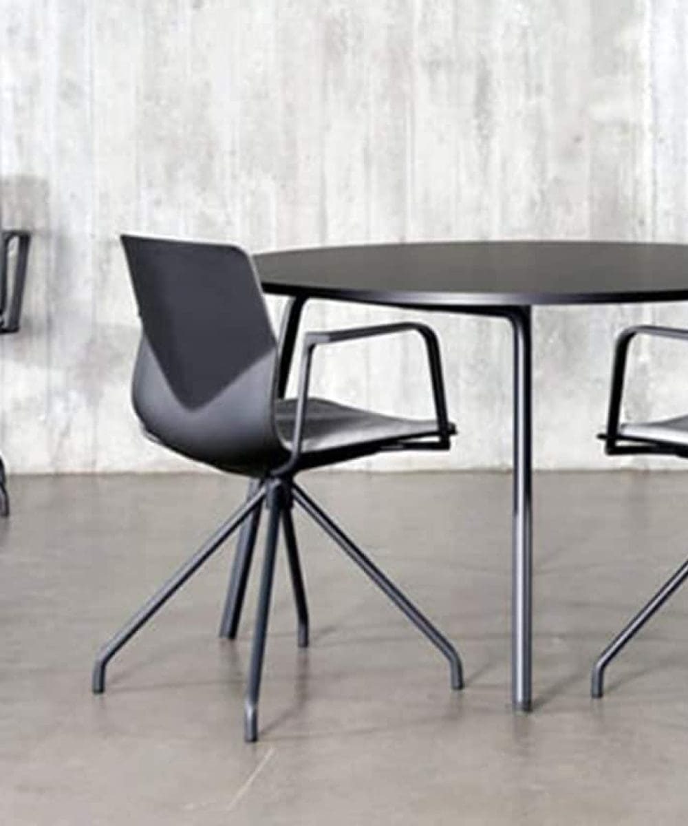 Black FourSure chair at table